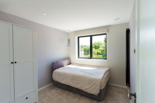one-off-house-new-build-bedroom-with-wardrobe-stone-builders-killiney-dublin-55
