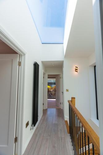 one-off-house-new-build-landing-with-roof-light-stone-builders-killiney-dublin-52