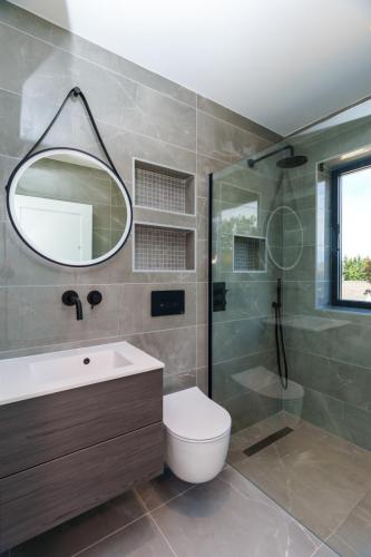 one-off-house-new-build-main-bathroom-with-floting-toilet-stone-builders-killiney-dublin-50